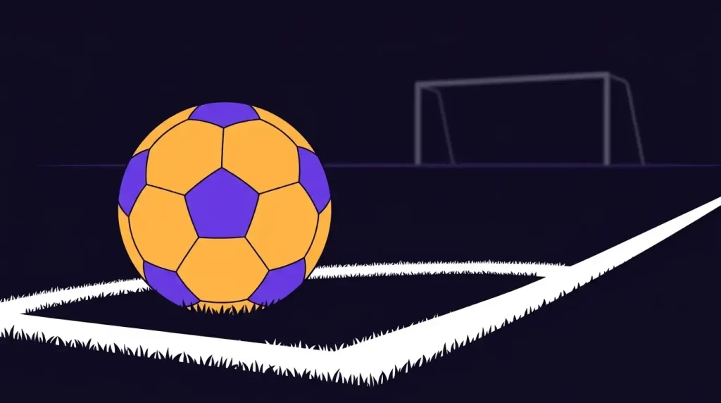 Ein Fußball im Rasen an einer Eckmarkierung mit einem Tor im Hintergrund